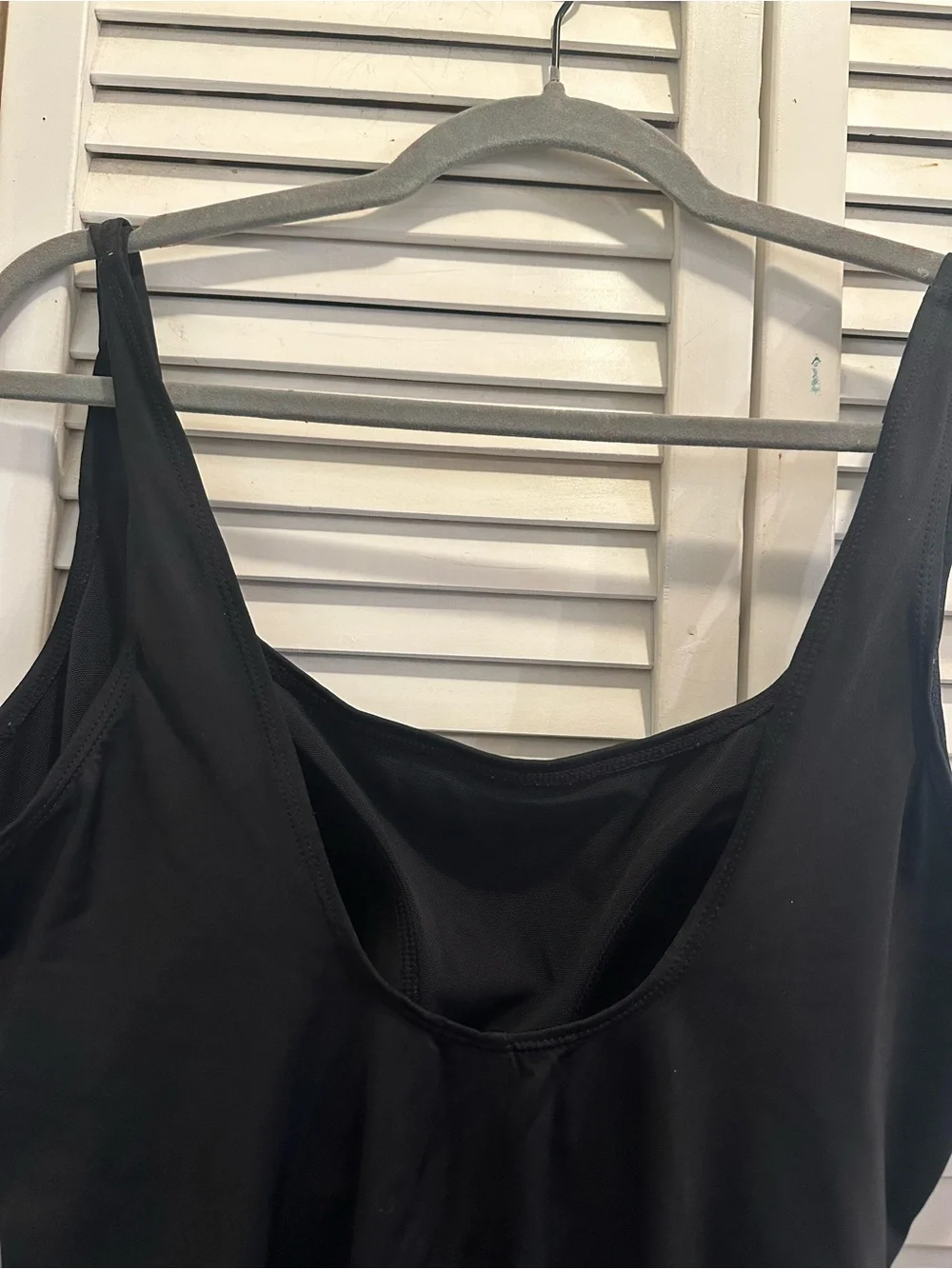 Black One-Piece Swimsuit with Blue Sequin Accent